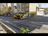 تداوم اجرای عملیات لكه‌گیری و روكش آسفالت در معابر شهرقدس/تكمیل اجرای روكش آسفالت كوچه هشترودیان در بلوار ۳۰ متری شورا